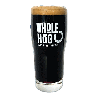 Dark beer in Whole Hog glass with foam.